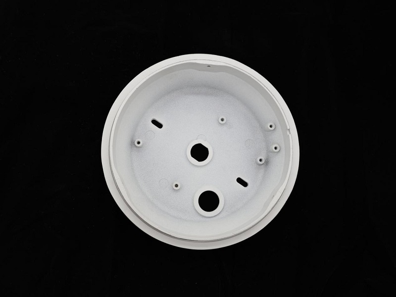 What protective requirements do die castings of lighting fixtures for outdoor use need to meet?